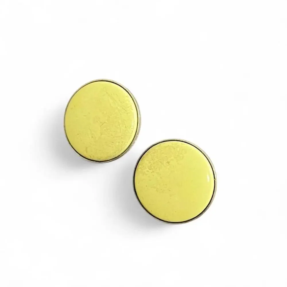 Yellow cufflinks with silver accents